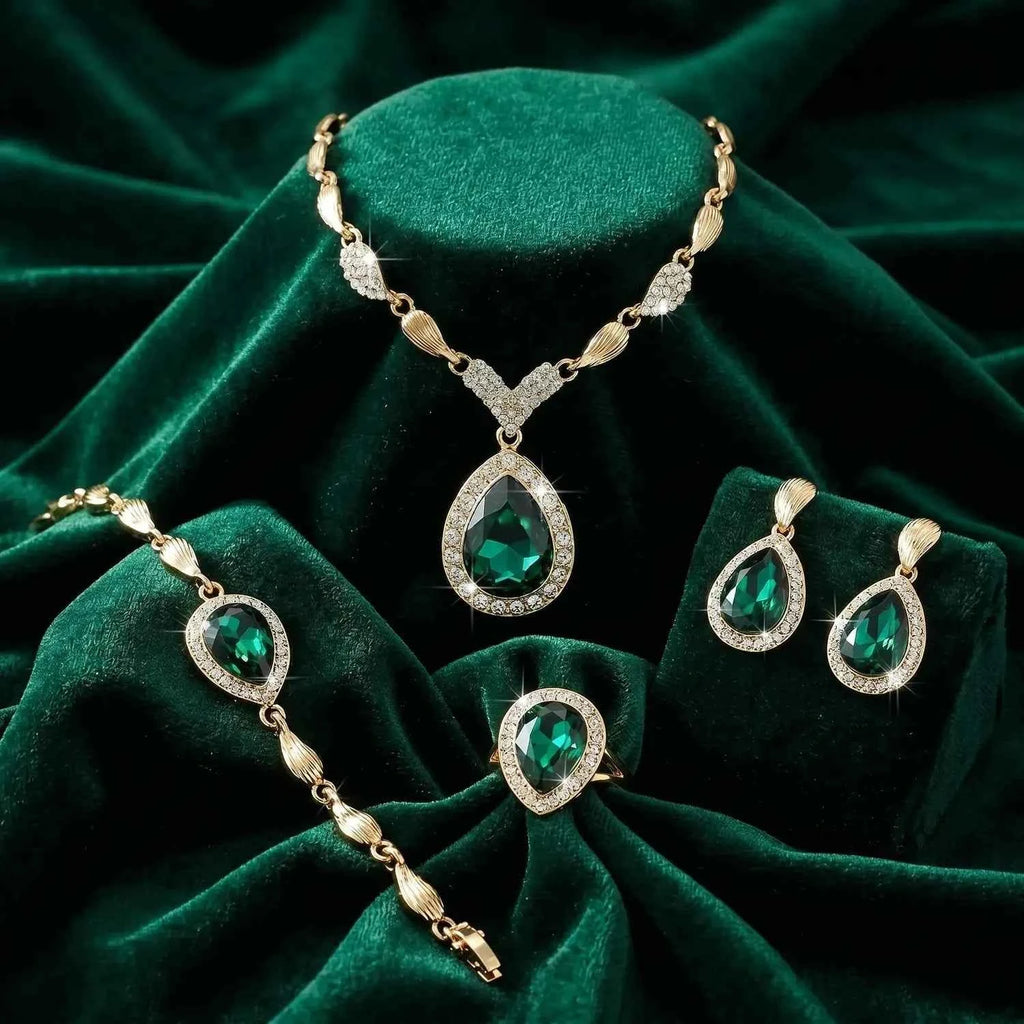 Emerald Teardrop Halo Jewellery Set