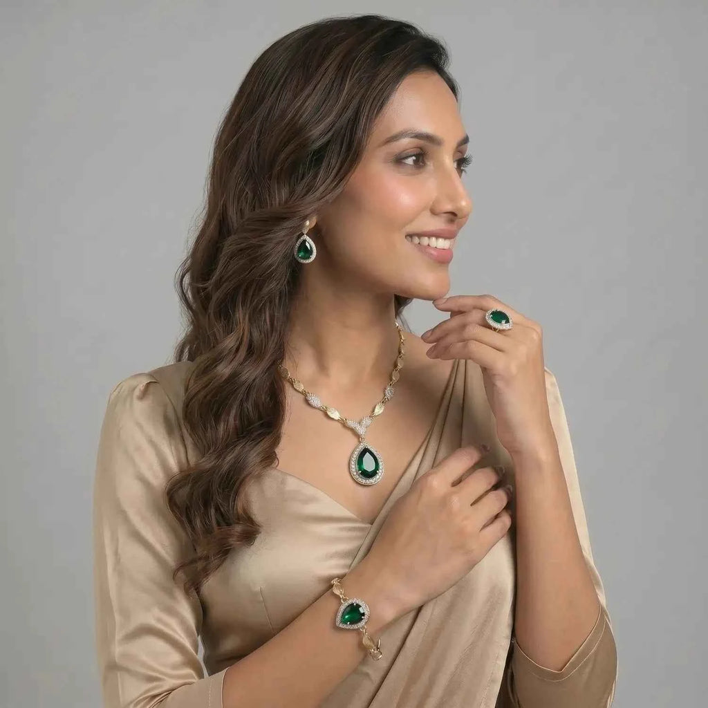 Emerald Teardrop Halo Jewellery Set